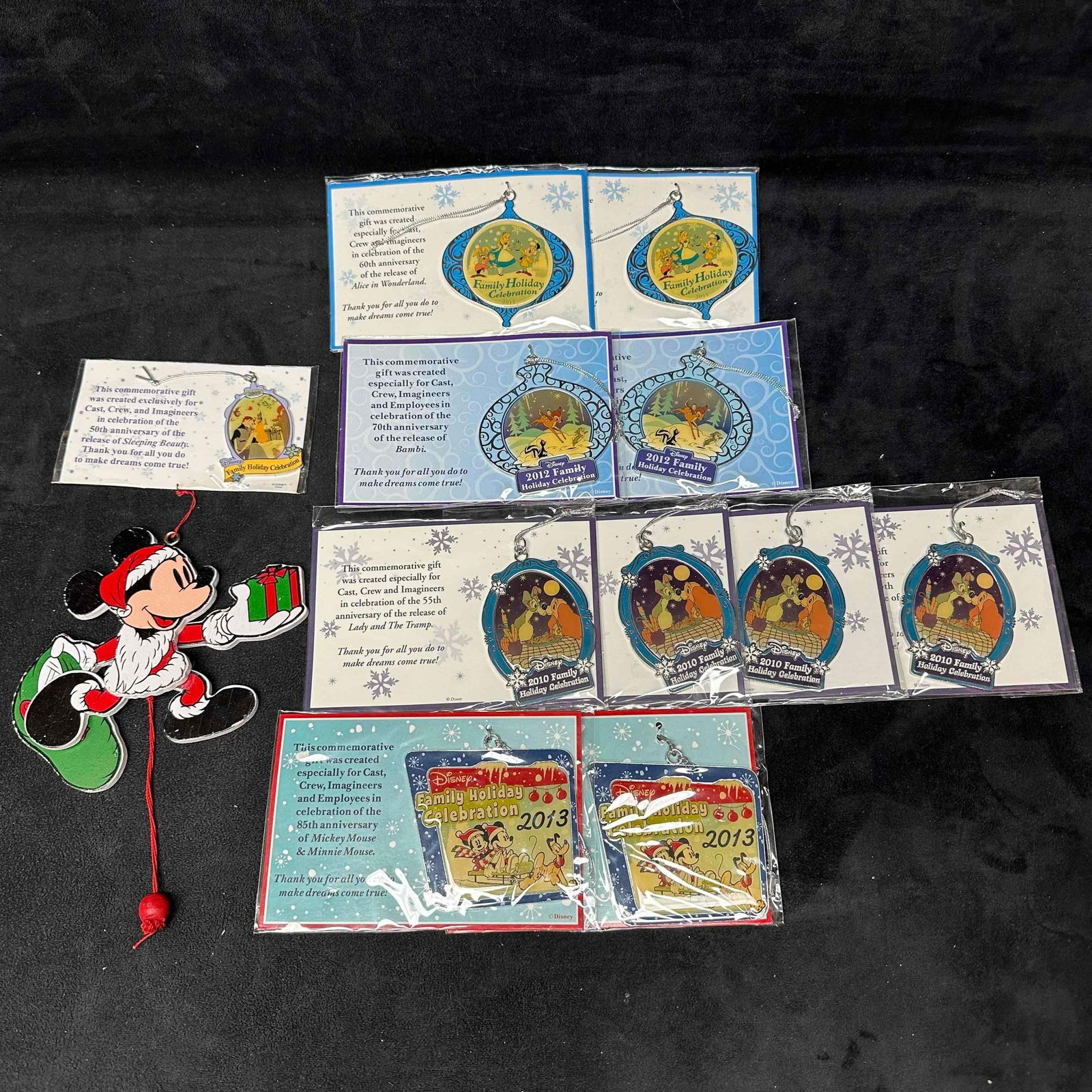 Disney Cast Holiday Ornament Collection Set Sleeping Beauty: Collection of twelve Disney ornaments with most being duplicates exclusive to Disney Cast members. Several Disney characters represented. These items are in good pre owned and like new, previously dis