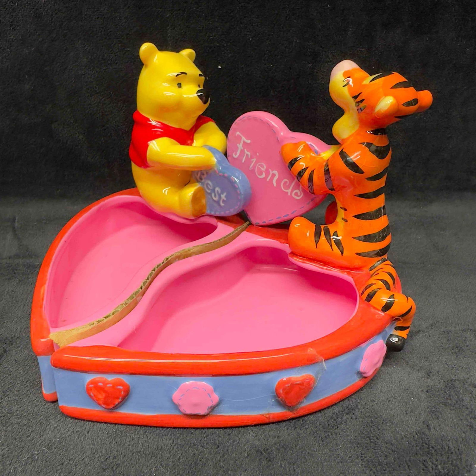 Disney Winnie the Pooh and Tigger Friends Trinket Dish Half Heart Valentine Bowl: Disney Winnie the Pooh and Tigger Friends Trinket Dish Half Heart Valentine Bowl. Light crazing is noticed on the porcelain. Light wear and staining marks on the bottom of the dish. This item is in