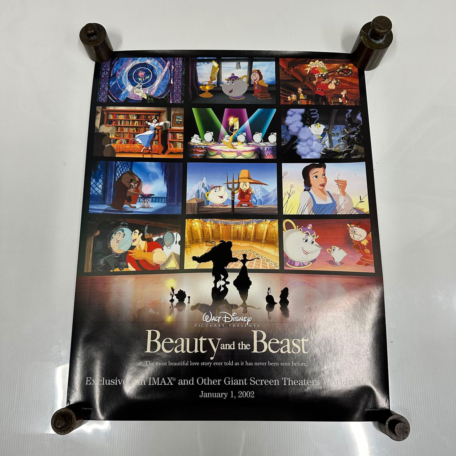 Walt Disney Beauty and the Beast IMAX Movie Poster: Original Walt Disney Beauty and the Beast movie poster promoting the IMAX and giant screen theatrical release, dated January 1, 2002. Features a collage of scenes from the film with central ballroom