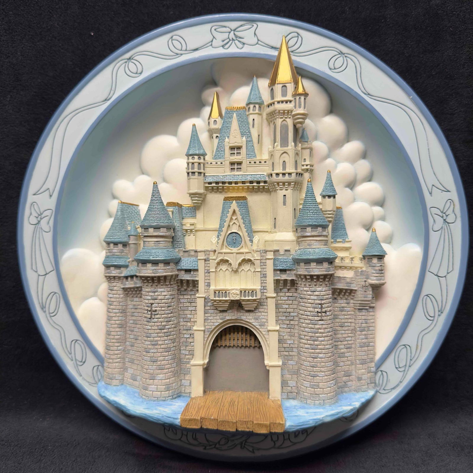 Cinderella Castle Walt Disney World Collectors 3D Plate Hanging Wall Collectible: Cinderella Castle Walt Disney World Collectors 3D Plate Hanging Wall Collectible. No noticeable chips or cracks, light marks on the back of the plate. This item is in good pre-owned, previously displa