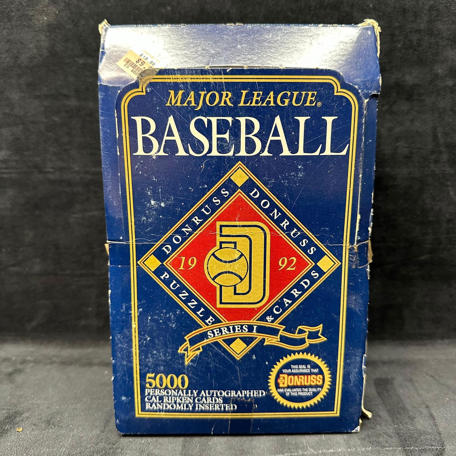 1992 Donruss Major League Baseball Series 1 Wax Box: 1992 Donruss Major League Baseball Series 1 trading card wax box by Leaf Inc. Box contains 36 factory packs of cards. Packaging shows visible shelf wear, creasing, and edge damage, but the packs appea