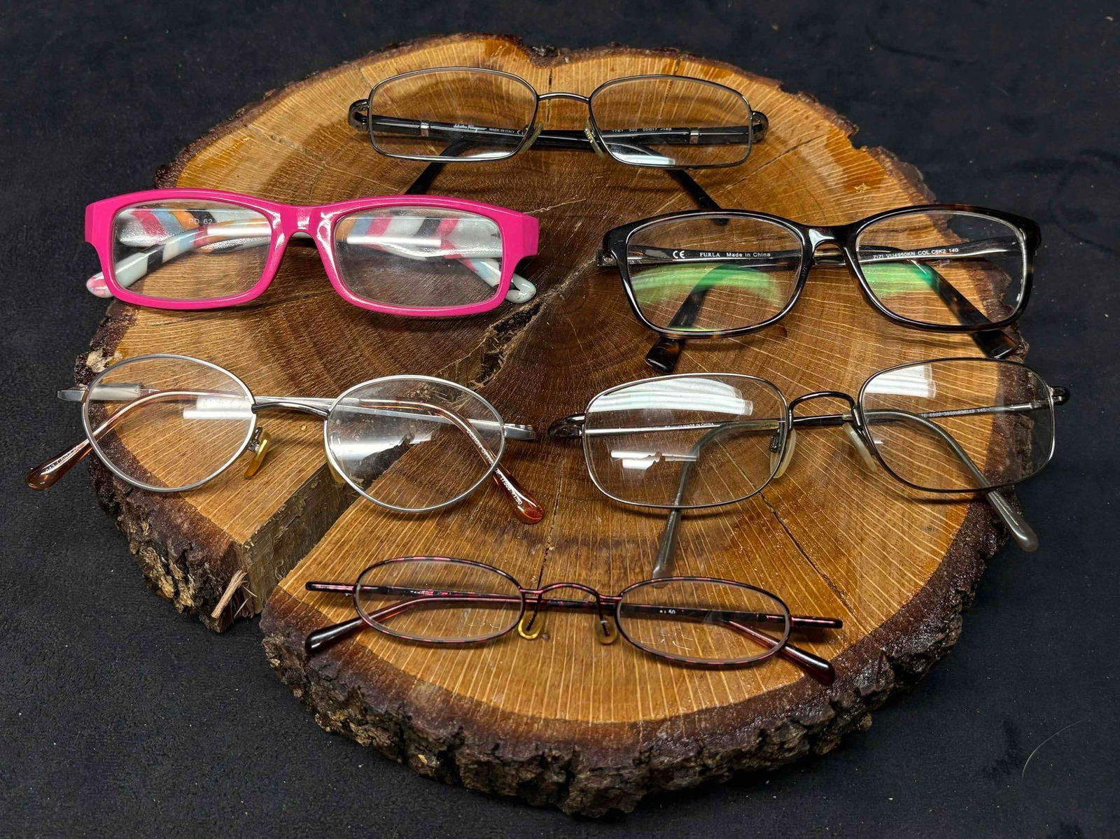 6pc Lot of MISC Vintage Glasses: This lot contains a bundle of MISC vintage eyeglasses, some of which coming with a case. Minor scratches can be found on a few of the lenses due to their age. A little dust and smudging that can easil