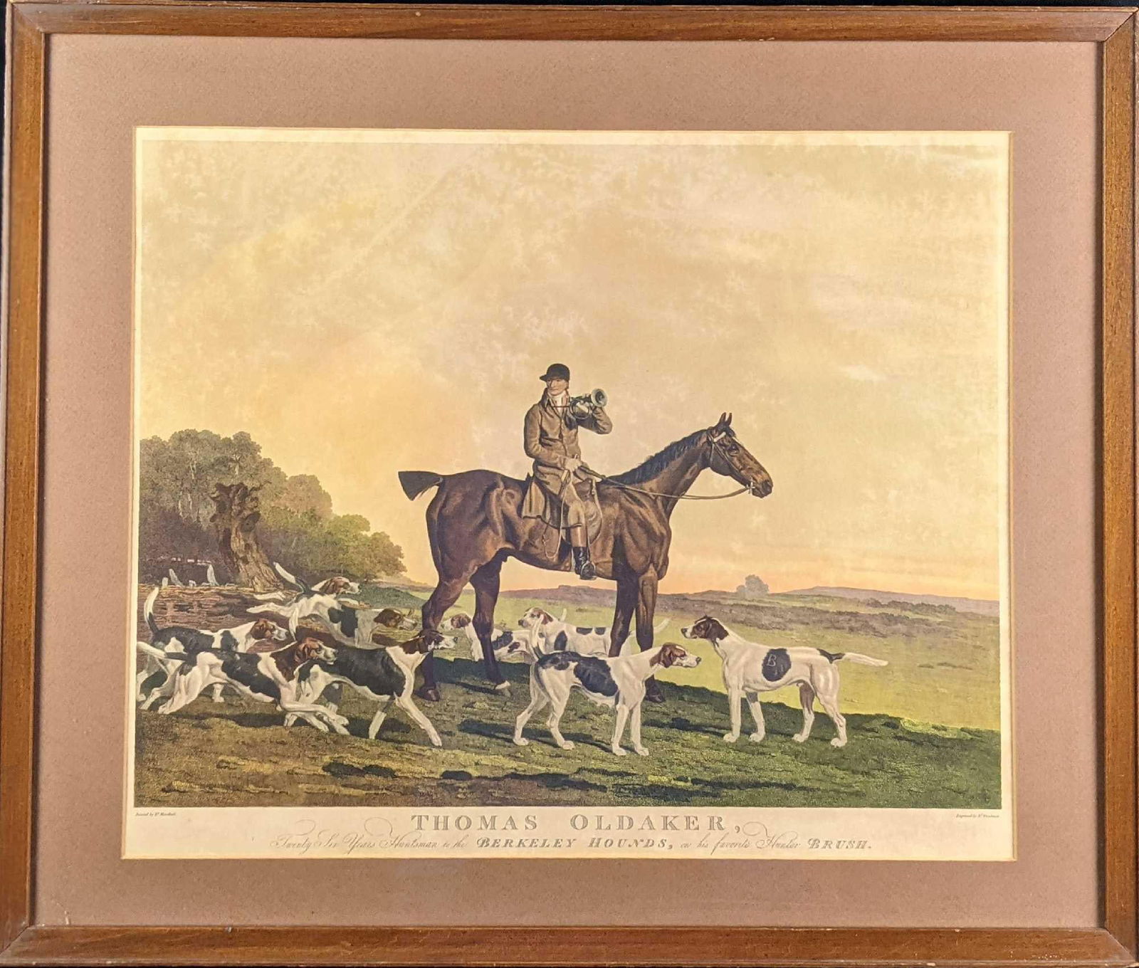 Framed Thomas Oldaker Huntsman To The Berkeley Hounds Color Etching: "Thomas Oldaker Twenty-Six Years, Huntsman To The Berkeley Hounds". The original had been painted by Ben Marshall, while the etching was produced by Rd. Woodman. The framed etching is approx