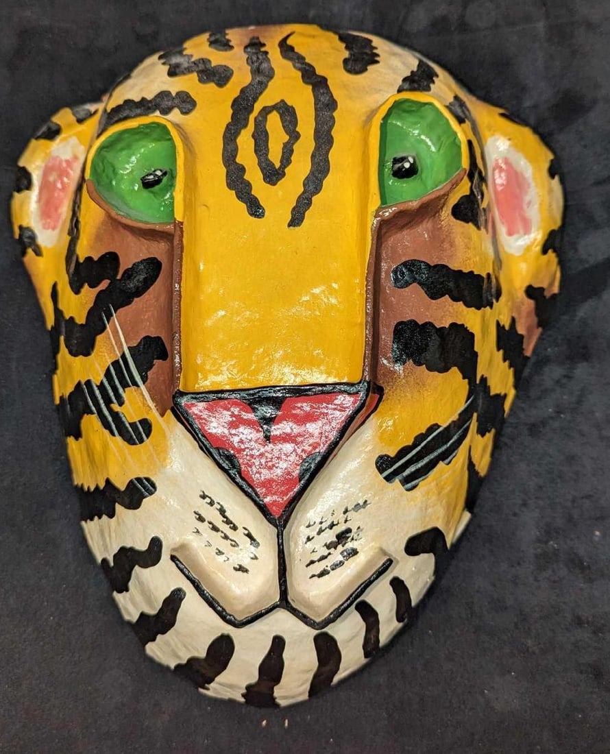 Paper Mache Haitian Aumakua Tiger Mask Wall Art: Paper Mache Haitian Aumakua Tiger Mask Wall Art. This is approx 11 1/2" x 5" x 13 1/4" and it weighs 0.82lb. There is some light wear on the mask and is missing its hook on the back. Please see the im