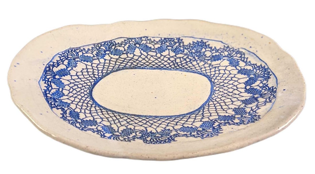 Handmade Textured Ceramic Serving Platter: Handmade Textured Ceramic Serving Platter. Artist signed the bottom. Has a nice textured design. The platter is approx 10" across and in a good, used condition with no known damage.