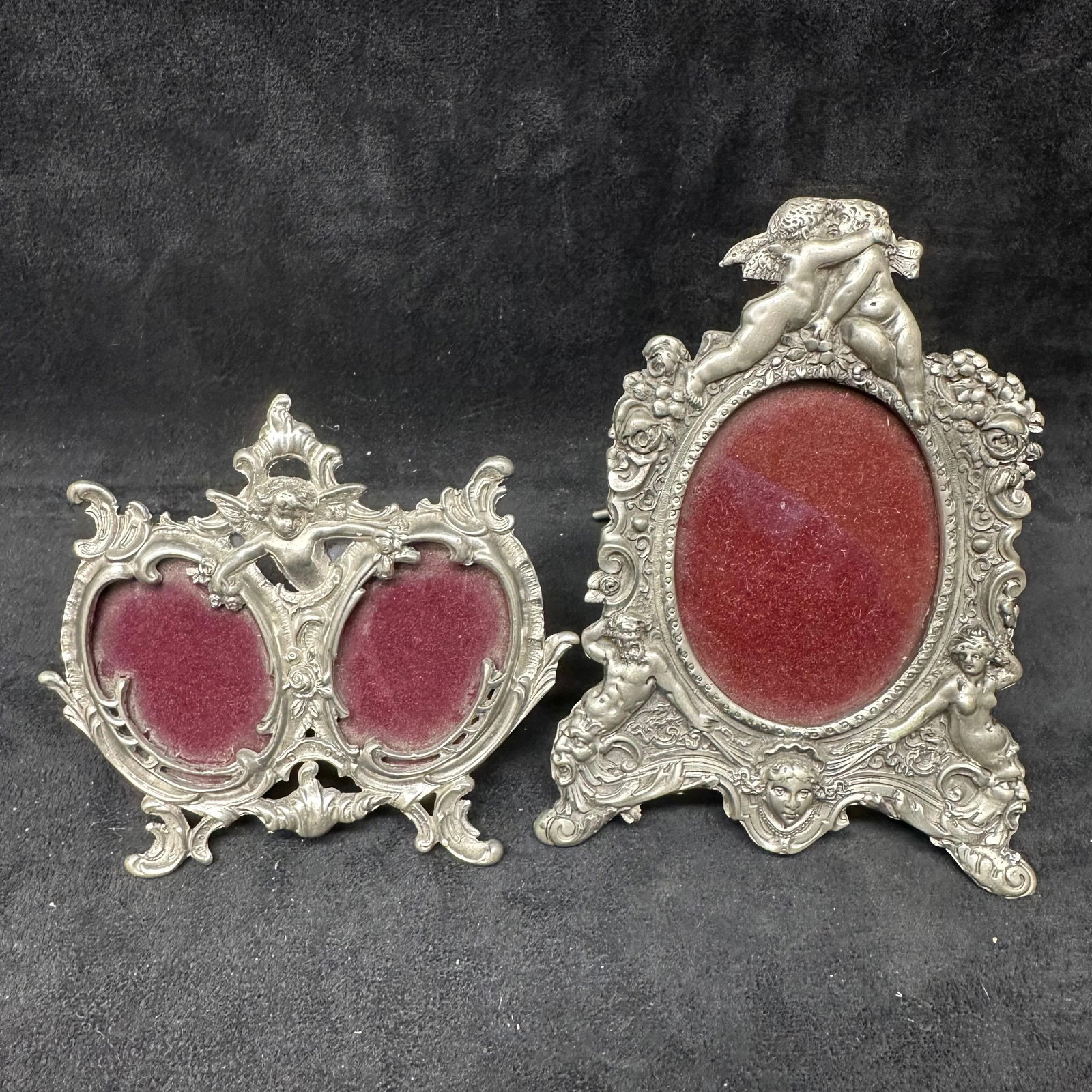 Victorian Rococo Revival Style Elias Fine Pewter and Sterling Picture Frame Set Cherub Angels: Elias Fine Pewter and Sterling picture frame set featuring angels/cherubs along the border of a Victorian Rococo Revival style design. Each frame shows hallmarks. These items are in pre-owned,