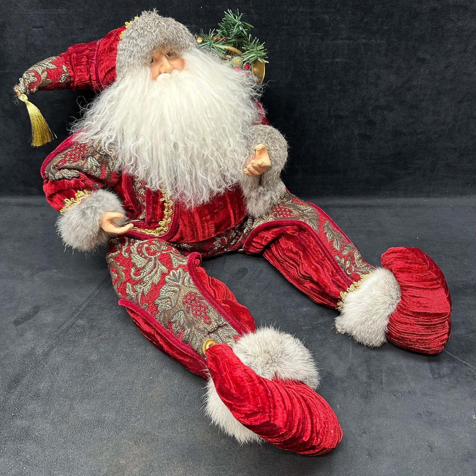 Decorative Victorian Style Santa Claus Figure in Red Velvet Costume Christmas: Large decorative Santa Claus figure dressed in an ornate red velvet style costume with gold pattern accents and faux fur trim. Santa has a long white beard, sculpted face and hands, curled shoes with