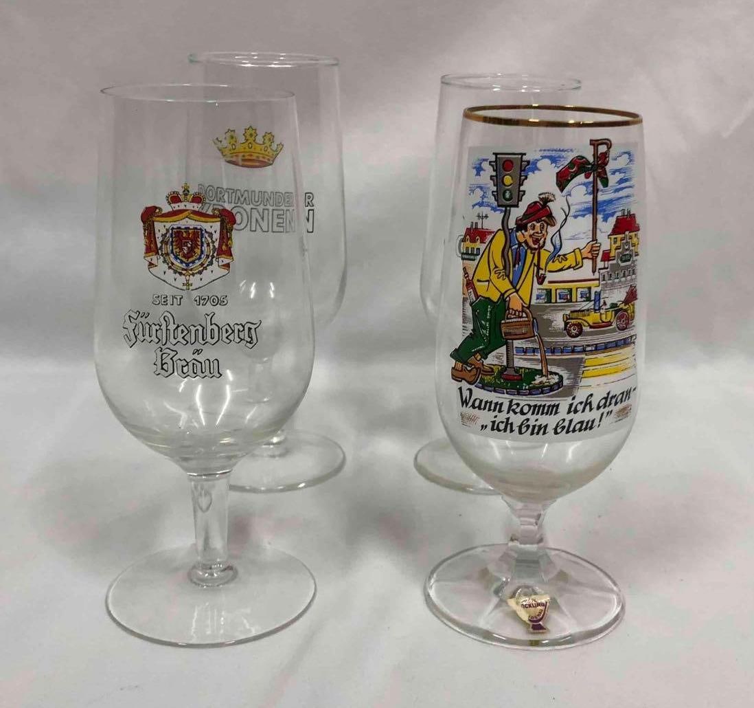 4 German Beer Glasses: This lot includes 4 German beer glasses. Please reference the pictures for numbering. Measurements for each glass are listed below. Altogether the glasses weigh about 1.1lbs. Overall the glasses are
