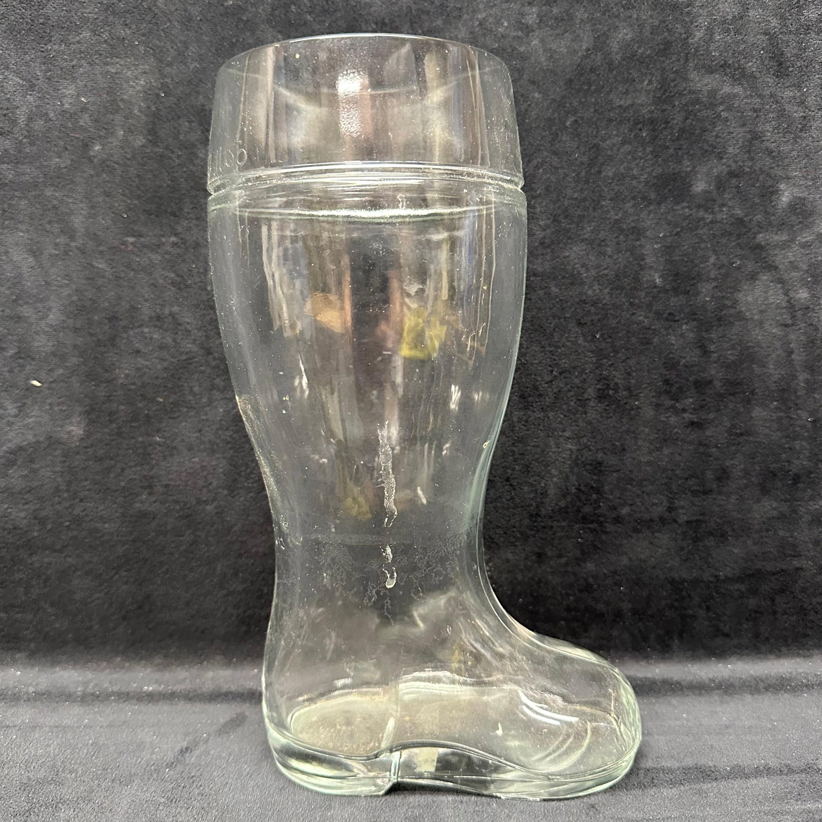 Large Glass beer Boot Das Boot Style Drinking Vessel Cup: Clear glass beer boot mug, classic Das Boot style design. Heavy molded glass with a solid base stands upright. Unmarked base. Light surface wear and residue consistent with age and use; no cracks or c