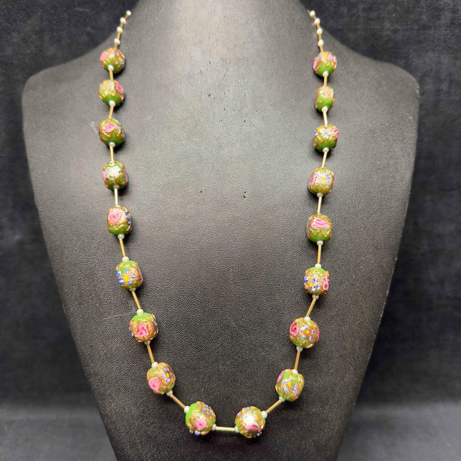 Murano Venetian Art Glass Lamp Work Green Round Bead Necklace D80: Murano Venetian Art Glass Lamp Work Green Round Bead Necklace D80. Necklace with green colored glass beads with beautiful hand painted designs on each. The necklace features copper colored and floral