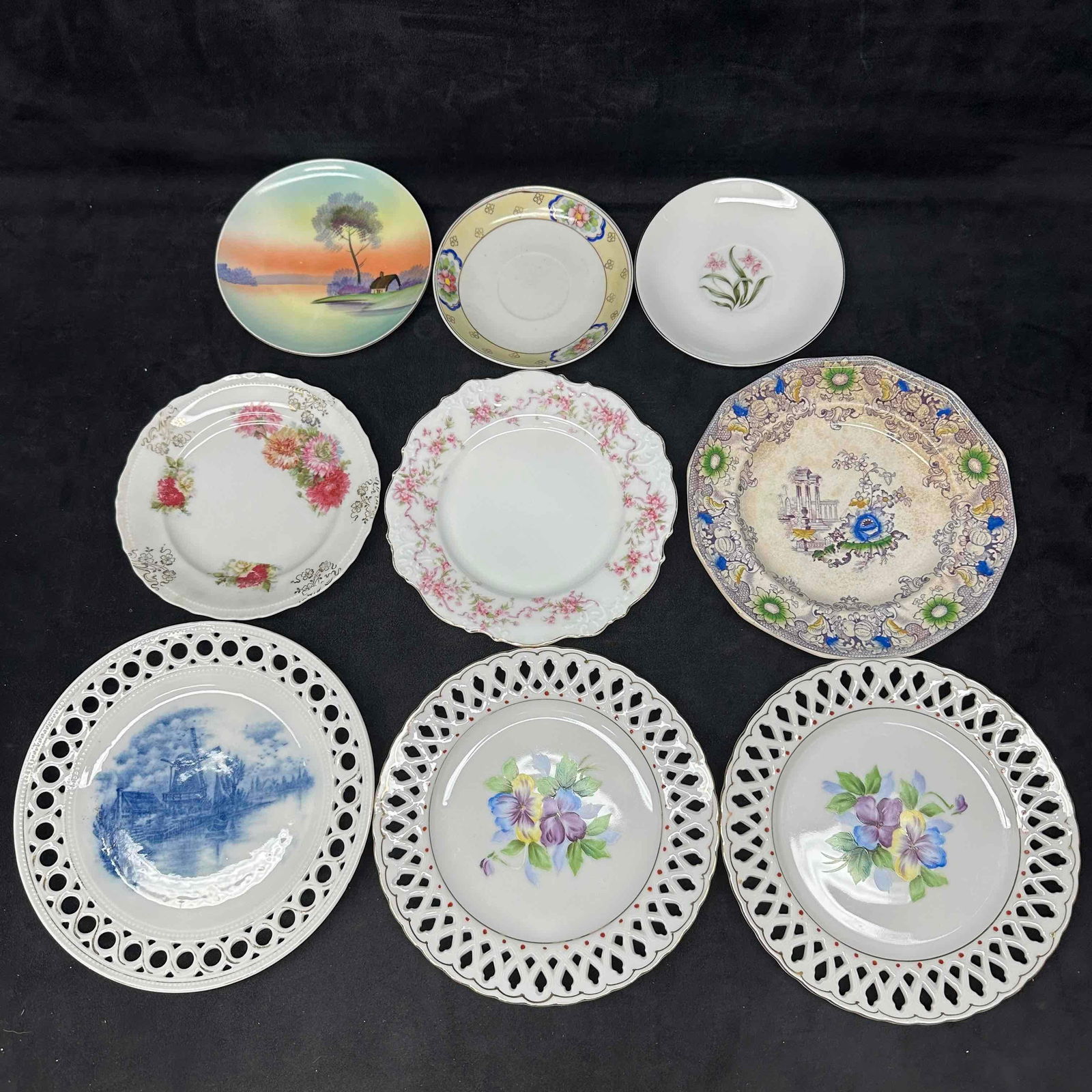 Assorted Decorative Plate Set Nine Plates Collection: Minor staining and marks throughout each plate due to storage and age. These items are in good pre-owned, previously displayed condition with light wear, and surface scratches. Please reference all