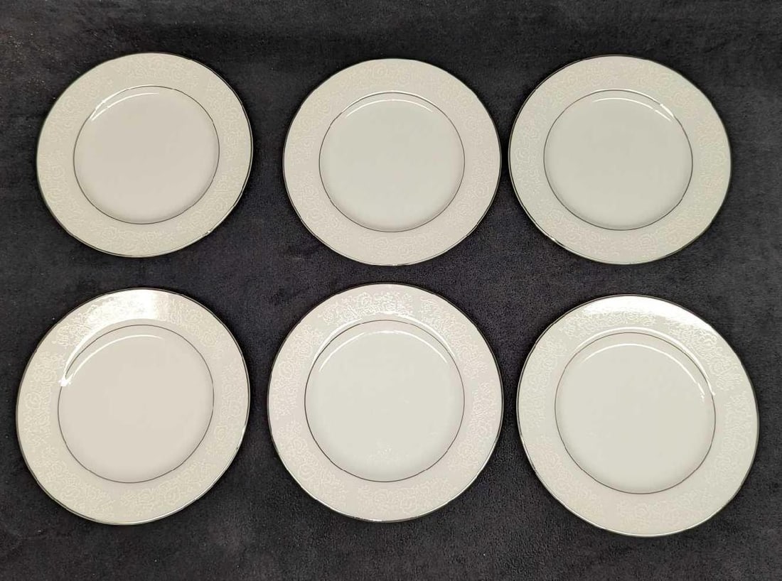 6 Retired International Juliet Bread & Butter Plates A: 6 Retired International Juliet Bread & Butter Plates A. Each plate is approx 6 3/8" x 6 3/8" x 5/8" and the total weight is 2.43lb. The plates are made of fine china and do not have any chips or