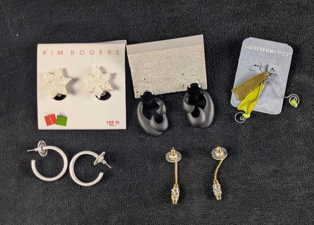 Assorted Fashion Earrings: Assorted Fashion Earrings This lot consists of five pairs of earrings. These are assorted pairs that include designs such as snowflakes, white hoop earrings, and more.