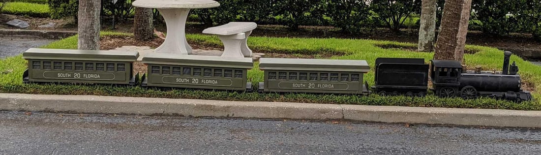 Large FEC Locomotive Historical Train Replica: This large wooden historical train is the replica of the FEC Locomotive #12 which is believed to be the first passenger train from 1896. This collector's train is from The Orange County History Museum