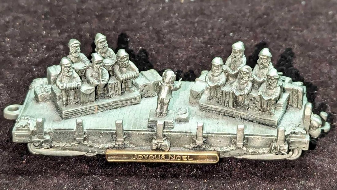 Pewter Santa's Express Joyous Noel Figurine: Pewter Santa's Express Joyous Noel Figurine. This is approx 4 1/8" x 1 1/2" x 1 1/2" and it weighs 0.37lb. This was released in 1998. The figurine has light wear.