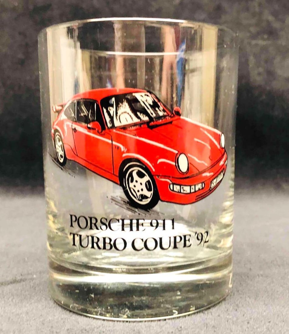 Porsche 911Turbo Coupe '92 Whiskey Glass: This lot contains a Porsche 911Turbo Coupe '92 Whiskey Glass. It is approx 3 1/4" x 3 1/4" x 4 1/4" and it weighs about 0.7lbs. Overall the glass is in good used condition with some light wear