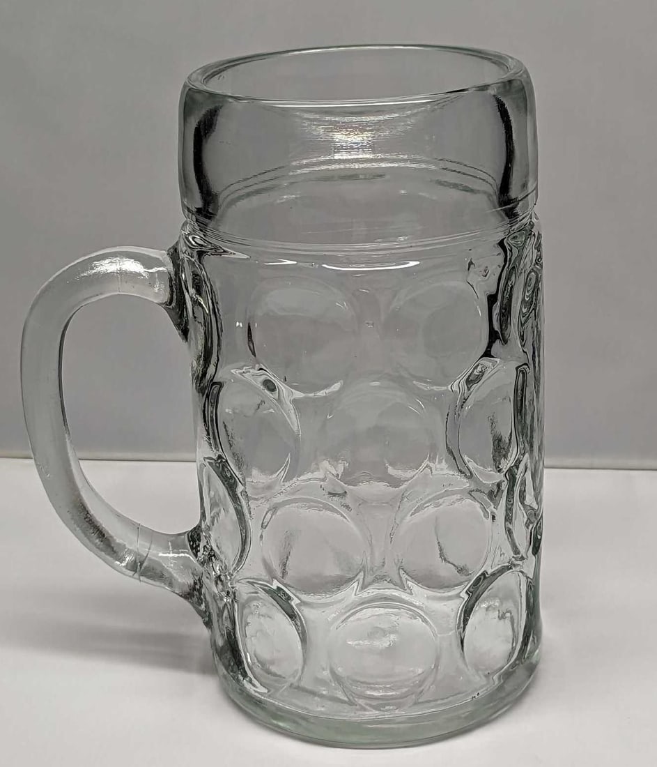 Libbey Glass Oktoberfest Mug: Libbey Glass Oktoberfest Mug. This is approx6 1/2" x 4 1/2" x 7 7/8" and it weighs 3.01lbs. The mug is in a good, used condition with a small chip on the handle.