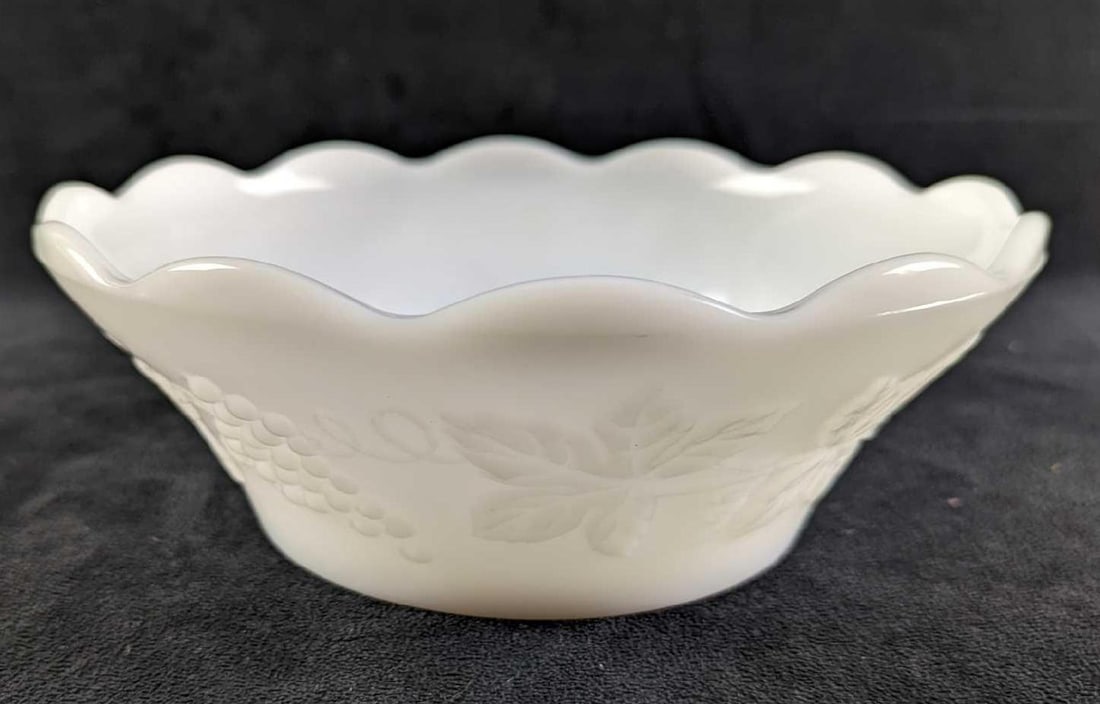 Vintage Anchor Hocking White Milk Glass Bowl: Vintage Anchor Hocking White Milk Glass Bowl. Has a nice grapevine design on the side. The bowl is approx 8 5/8" x 8 5/8" x 3" and it weighs 1.79lb.