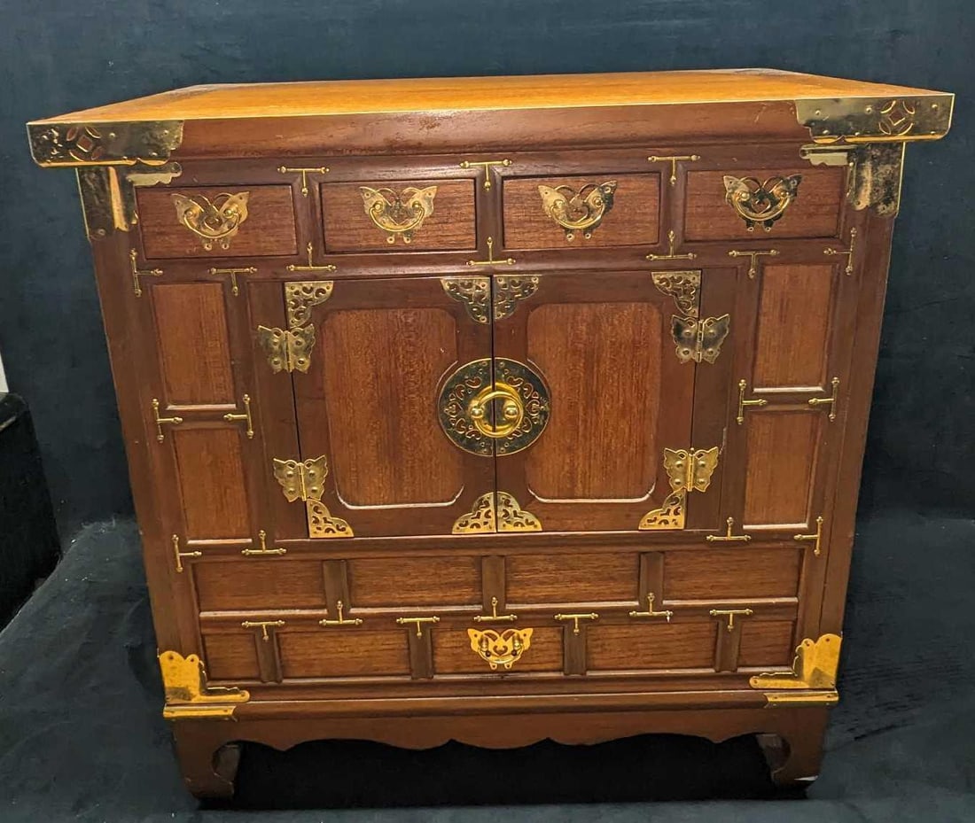 Burl Wood Vintage Chinese Apothecary Cabinet B: Burl Wood Vintage Chinese Apothecary Cabinet B. This is approx 24" x 14" x 24 1/2" and it weighs 33.30 lbs. This was made by Cathay Furniture. With brass tone mounts. The cabinet is in