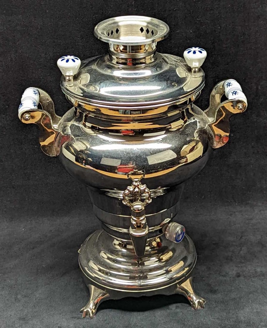 Incomplete Odessa Beem Samowar Tea Machine: Incomplete Odessa Beem Samowar Tea Machine. Stainless steel tea machine is missing its cord and the top tea kettle. Is approx 11" x 10" x 15" and it weighs 7lbs. Is in a good,used condition with