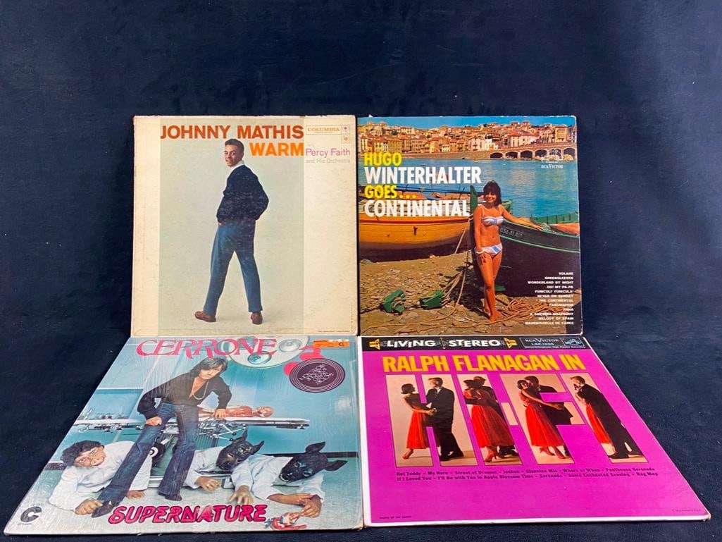 Assorted Vintage Records, 12" Vinyl: Assorted Vintage Records, 12" Vinyl This is an assorted lot of vintage vinyl records. Ralph Flanagan- In Hi-Fi Cerrone- Supernature Hugo Winterhalter- Goes... Continental Johnny Mathis- Warm