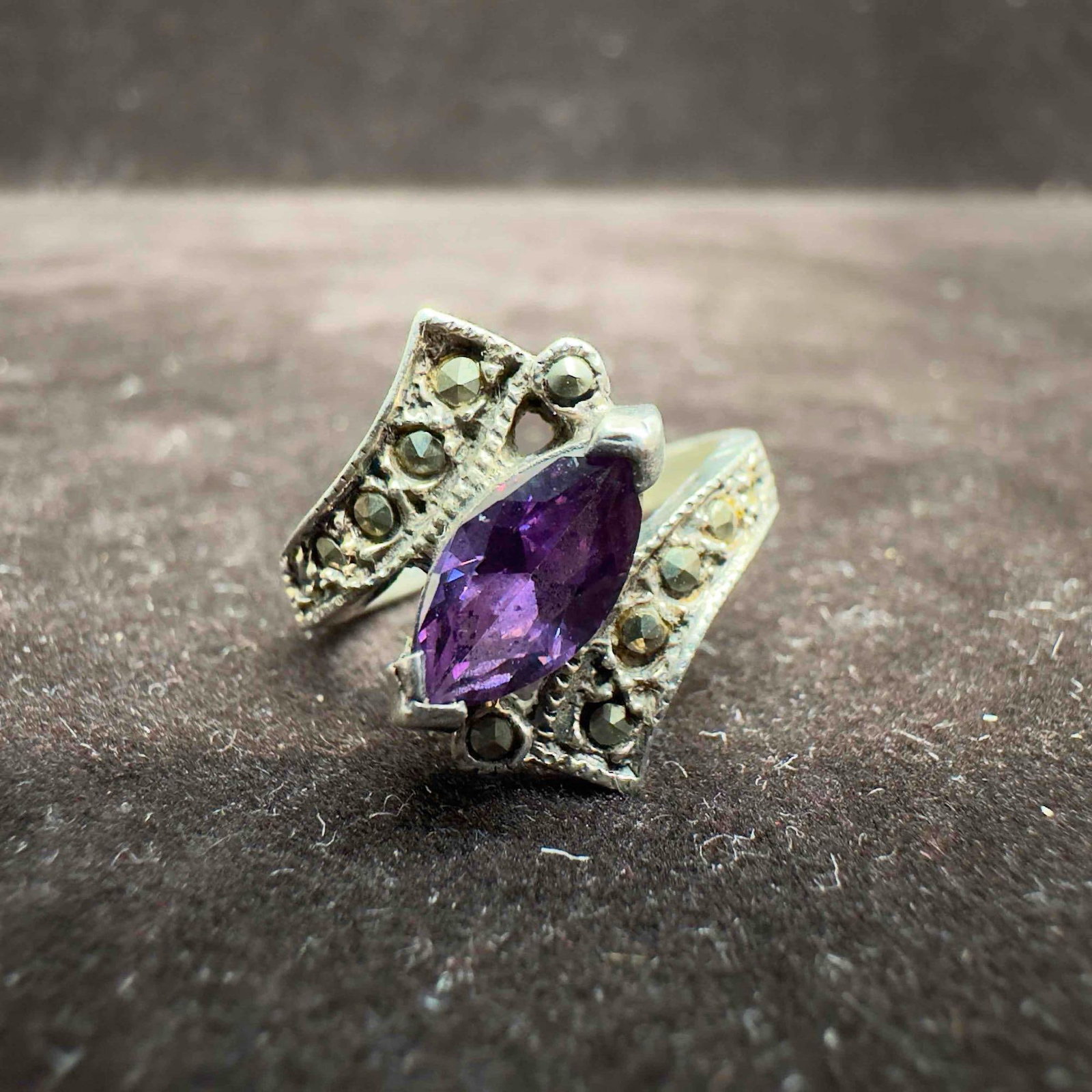 Sterling Silver Thailand 925 Marquise Cut Amethyst Marcasite Accent Ring: This item is in good pre-owned, previously used/displayed condition with noticeable light wear, and surface scratches. Please reference all photos for full details. This piece of jewelry has been test