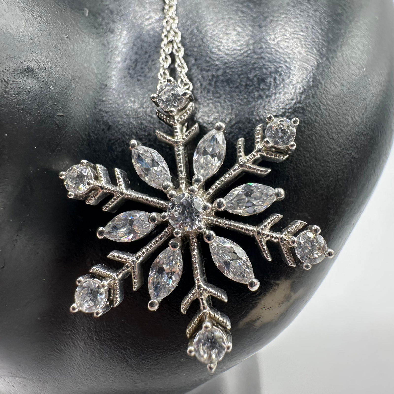 Sterling Silver Snowflake Pendant Round Cut Cubic Zirconia Accents: This item is in good pre-owned, previously used/displayed condition with noticeable light wear and surface scratches. Please reference all photos for full details. DETAILS: Metal - Sterling