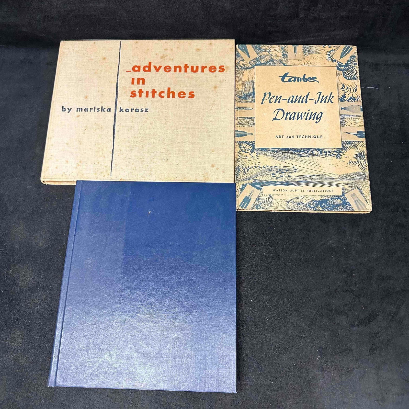 Craft and Art Book Trio Adventures in Stitches Pen-and-Ink Drawing Country Fabric Scrap Crafts: This lot includes three vintage craft and art instructional books. Adventures in Stitches by Mariska Karasz, Pen-and-Ink Drawing: Art and Technique by Frederic Taubes, and Country Fabric Scrap Crafts