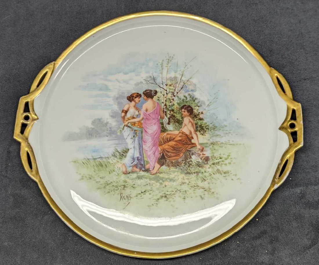 Vintage Porcelain Young Man With Maidens Platter: Vintage Porcelain Young Man With Maidens Platter. The platter is signed by a "Rene". The image is of what is considered an "Allegorical scene with maidens and a young man'. The platter is approx 15