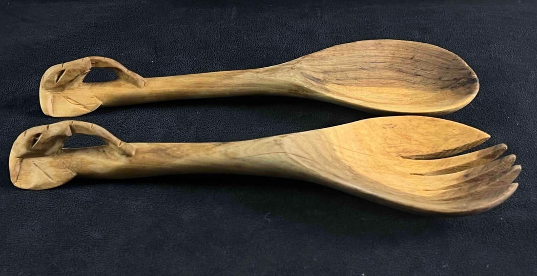 Wood Carved Spoon and For w Elephant Head Carving: Wood Carved Spoon and For w Elephant Head Carving pictured is a pair of wooden carved fork and spoon with elephant head handles. This set is in fair condition with some cracks on the spoon from age. T