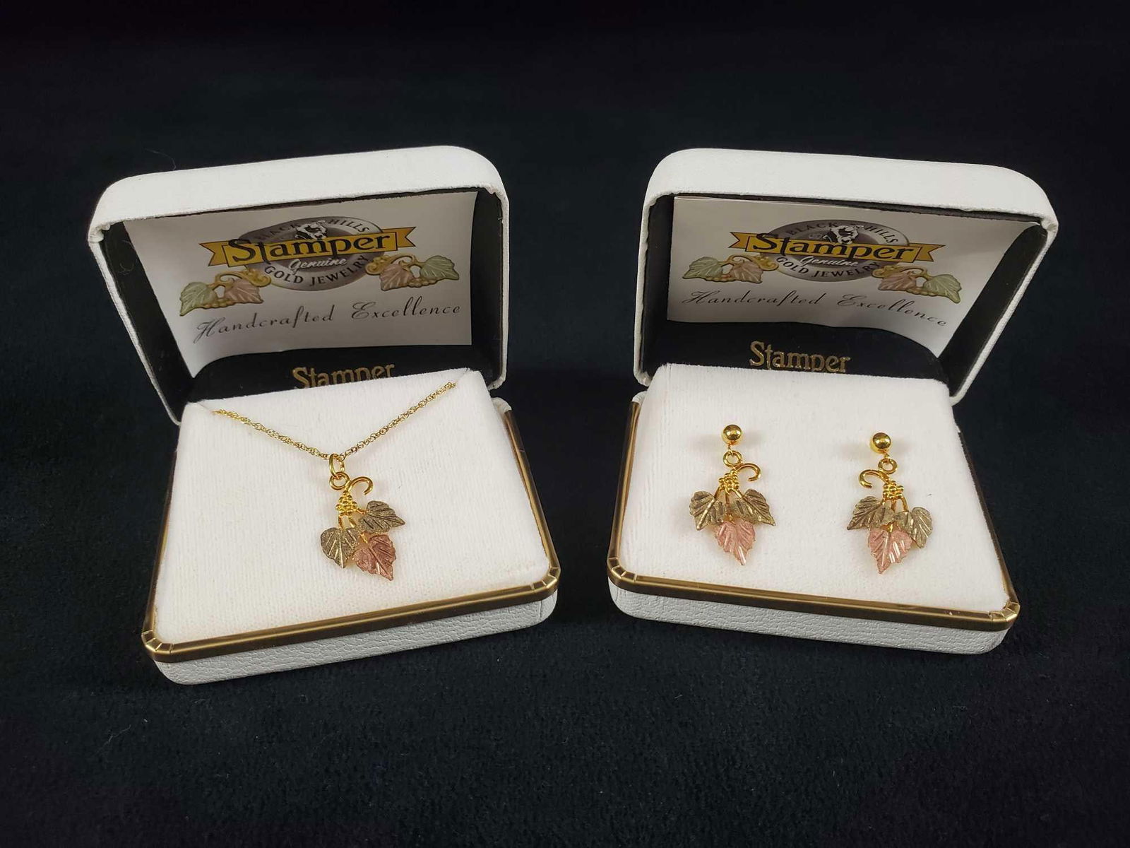 12K Gold Leaf Earrings and 10K Necklace Set by Stamper Genuine: 12K Gold leaf dangle earrings and 10K gold leaf charm and necklace by Stamper Genuine Black Hills in South Dakota, USA. The dangle earrings have a ball post and the back of the design is stamped