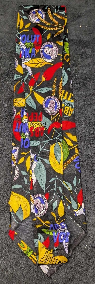 Absolut Vodka Nicole Miller Silk Tie New D: Absolut Vodka Nicole Miller Silk Tie New D. 100% silk tie designed by artist Nicole Miller, for Absolut Vodka in the 1990s. This silk tie is still in the original packaging and has never been used or