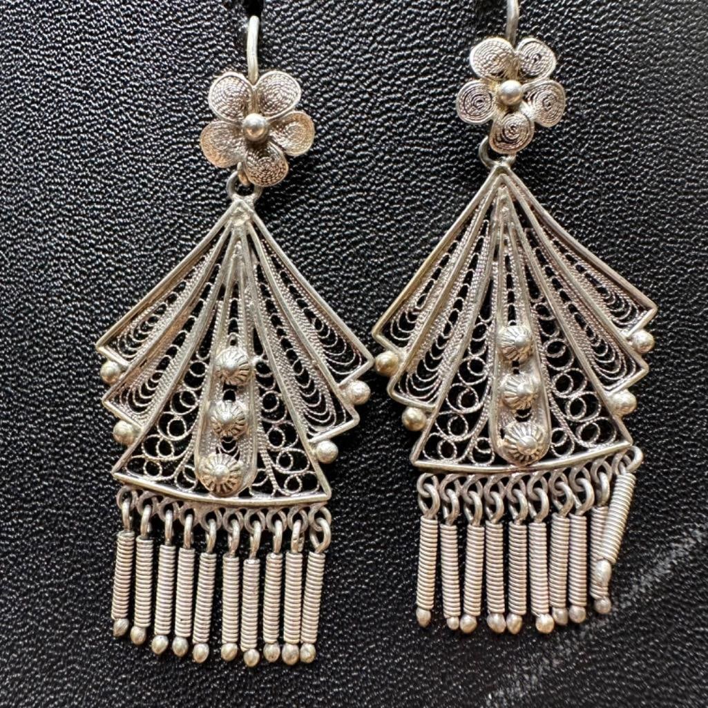 .800 Silver Deco-Style Dangle Earrings: This piece of jewelry has been tested and researched prior to listing. Please view all our pictures they are part of our description. DETAILS: Metal - .800 SilverColor - SilverStones - noneHallmarks