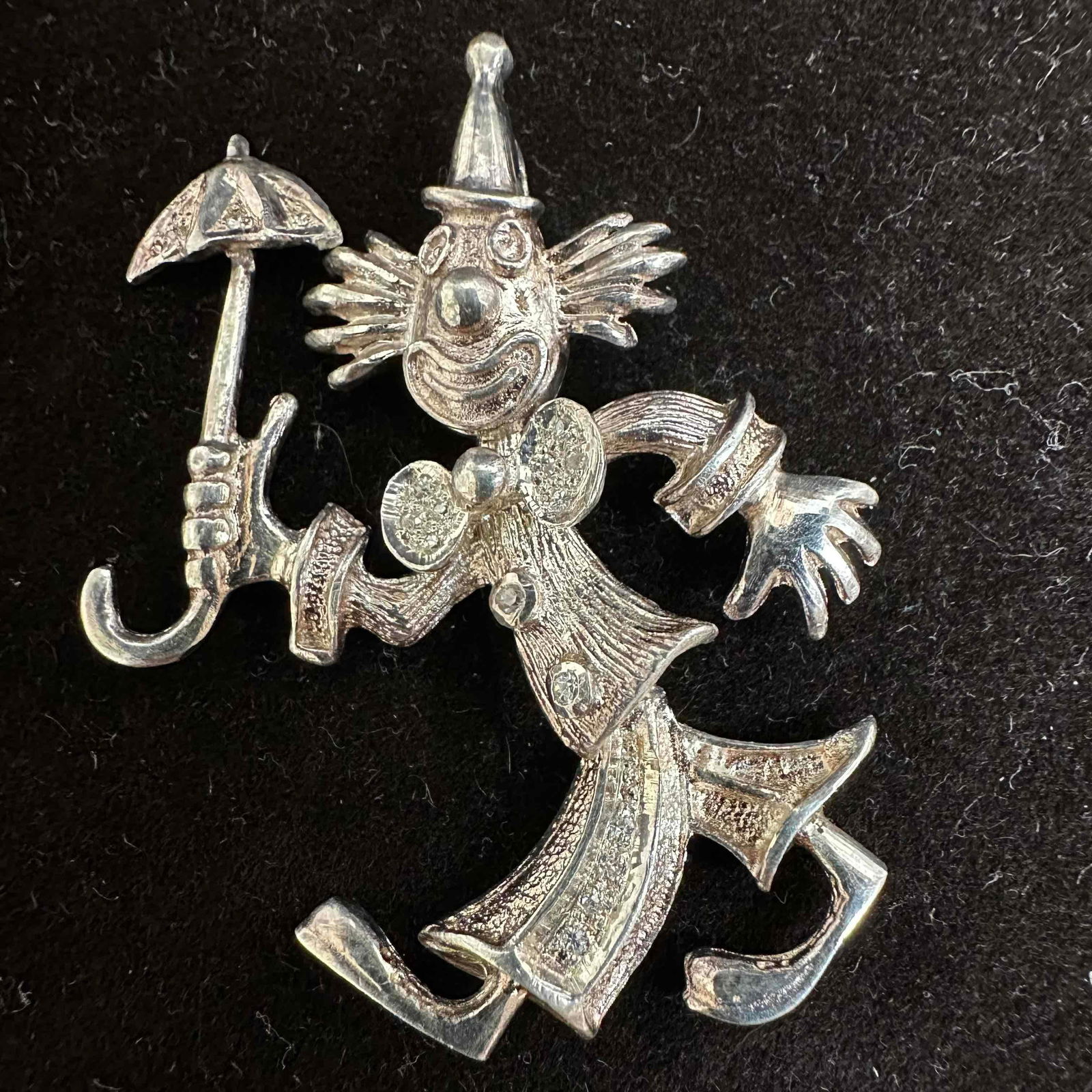 Cubic Zirconia Moveable Poseable Clown Sterling Silver Pendant: This item is in good pre-owned, previously used/displayed condition with noticeable light wear, and surface scratches. Please reference all photos for full details. This piece of jewelry has been