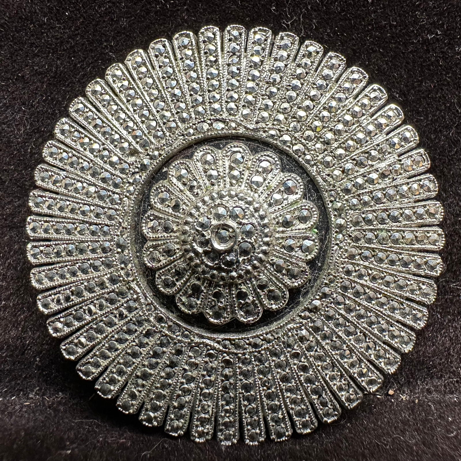 Sterling Silver and Marcasite Sunburst Brooch KD Signed: This item is in good pre-owned, previously used/displayed condition with noticeable light wear and surface scratches. Please reference all photos for full details. This piece of jewelry has been