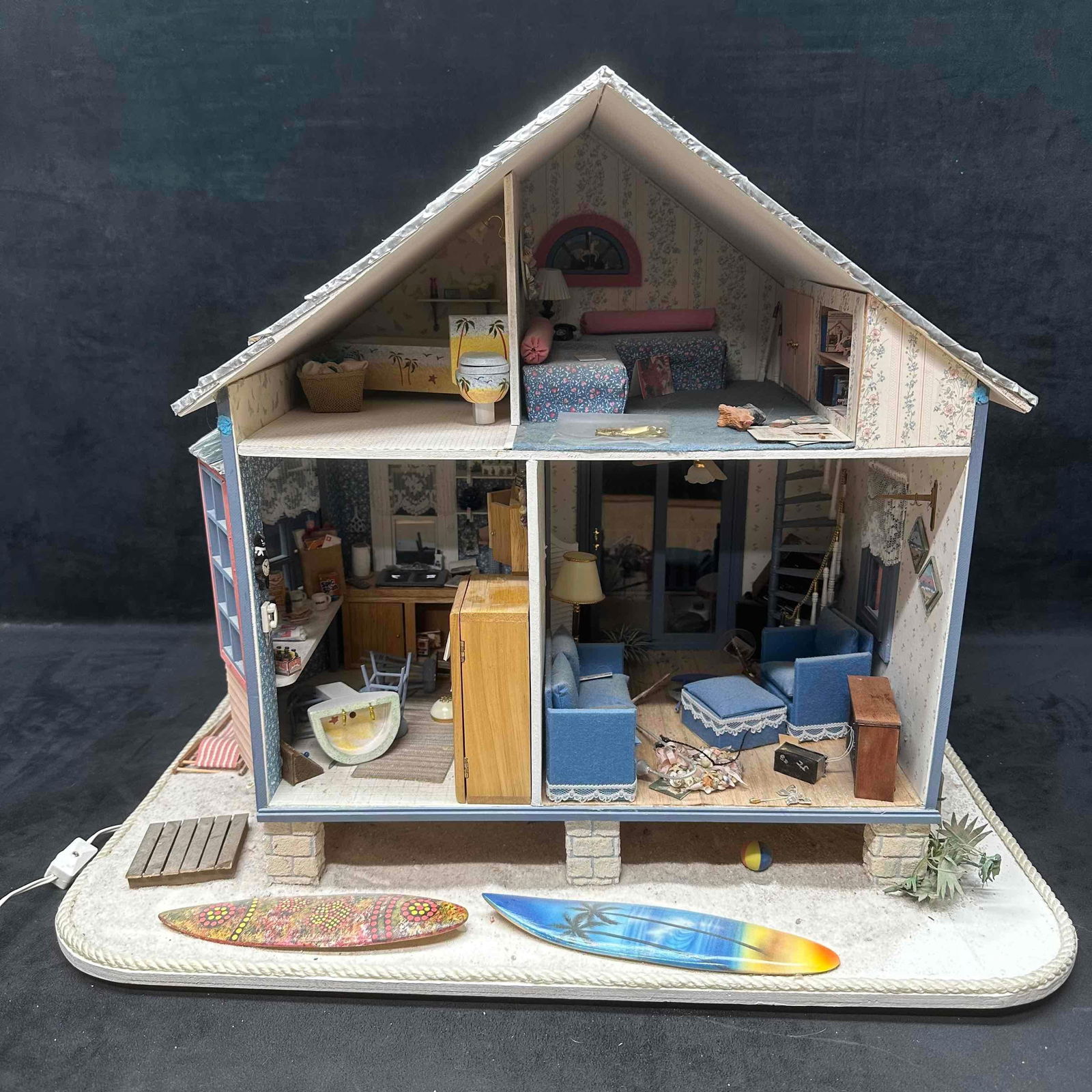 Large Lighted Rotating Miniature Dollhouse with Surfboards and Furnishings Beach Bungalow: Large handcrafted miniature beach house bungalow themed dollhouse on a rotating base with working lights. Highly detailed interior and exterior with multiple rooms, including furnished kitchen, living