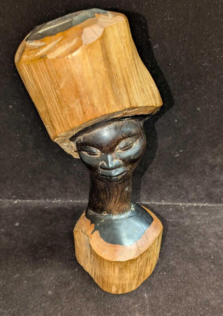 Vintage Hand Carved African Style Ebony Female Bust A: Vintage Hand Carved African Style Ebony Female Bust A. This is approx 4 1/2" x 4 1/2" x 10" and it weighs 3.28lbs. The maker and date of creation is unknown.