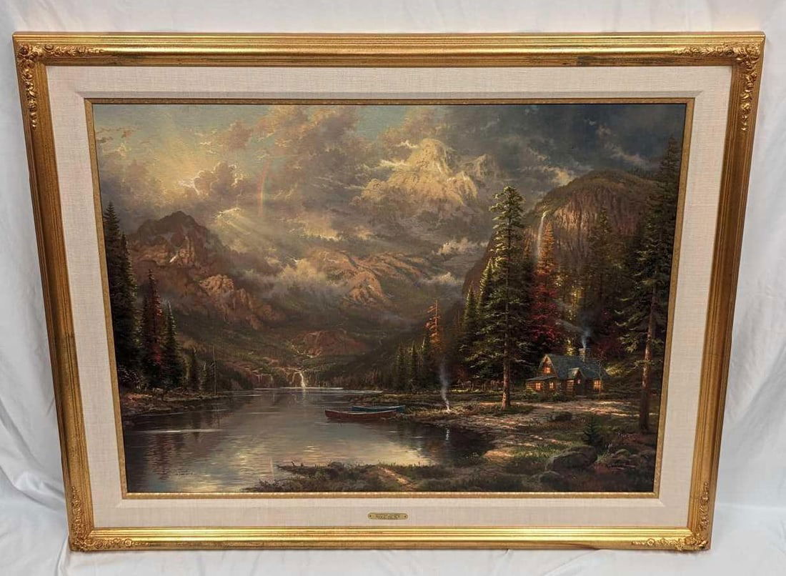 Framed S&N Thomas Kinkade Mountain Majesty R/E Print: Framed S&N Thomas Kinkade Mountain Majesty R/E Print. This framed print on canvas is approx 48 1/2" x 2 1/2" x 38 1/2" and it weighs 20 lbs. This is a R/E or "Renaissance