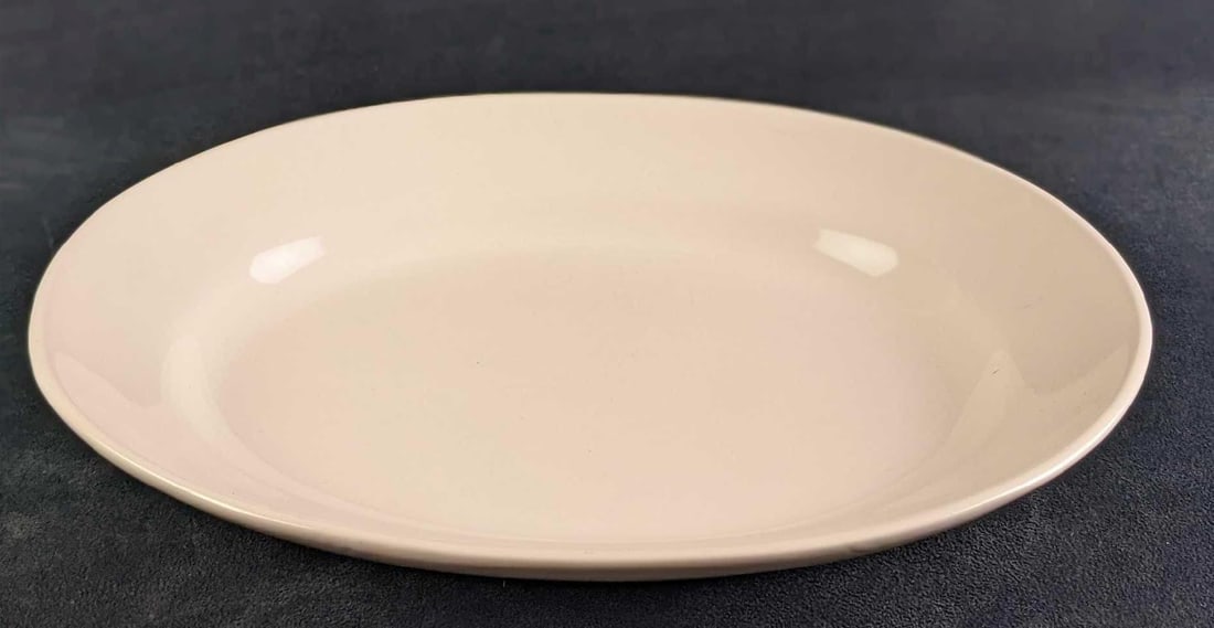 Blanc De Blanc Oval Platter By Tabletops Gallery: Blanc De Blanc Oval Platter By Tabletops Gallery. Made of fine china. Is approx 14 1/2" x 11" x 2" and weighs 3lbs. This series was released from 1999 - 2005. Is in a good, used condition with a