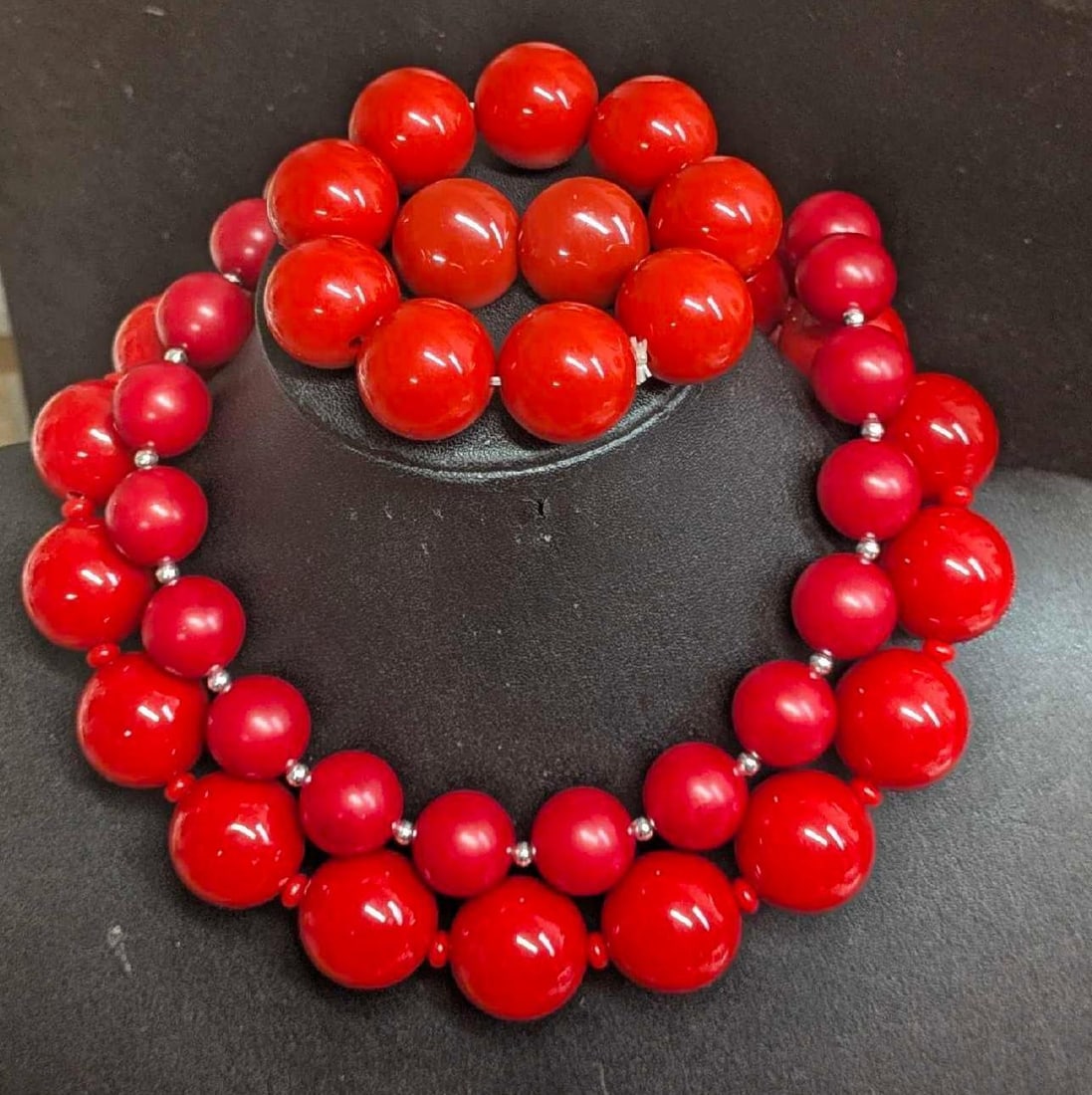 Vintage Resin Red Ball Necklaces Bracelets Earrings: Vintage Resin Red Ball Necklaces Bracelets Earrings. The fat ball necklace is approx 1" x 21" x1". The smaller beaded necklace is approx 3/4" x 21" x 3/4". The bracelet is approx 3" x 3" x 3/4". The