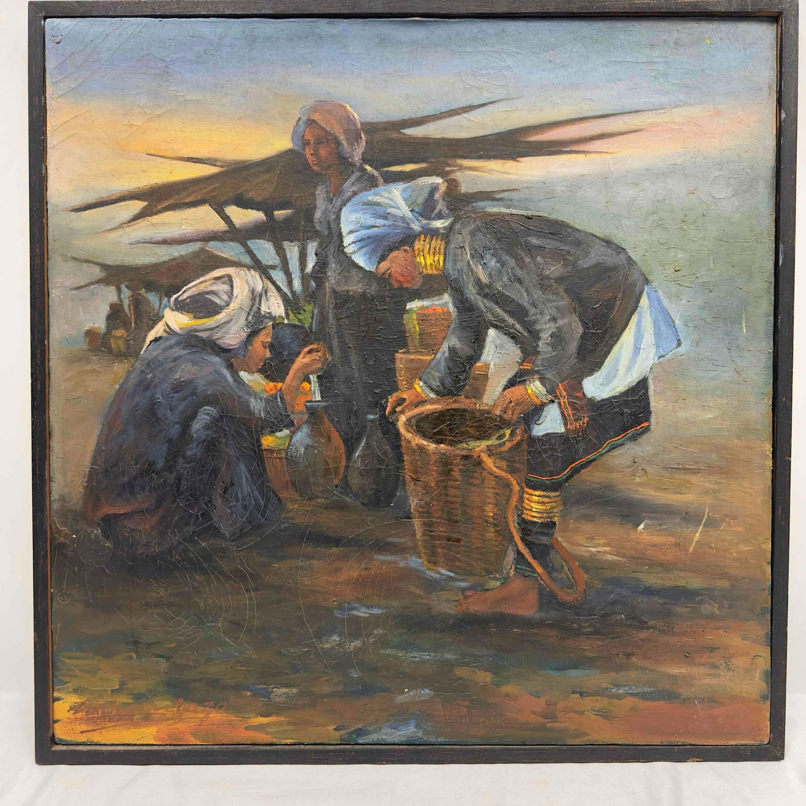 Foreign Women Folk Art Oil Painting Canvas Wooden Frame: Foreign Women Folk Art Oil Painting. This folk art oil painting features women with baskets. Unknown artist signed in the bottom left hand corner of the painting. Light cracking is noticed within the