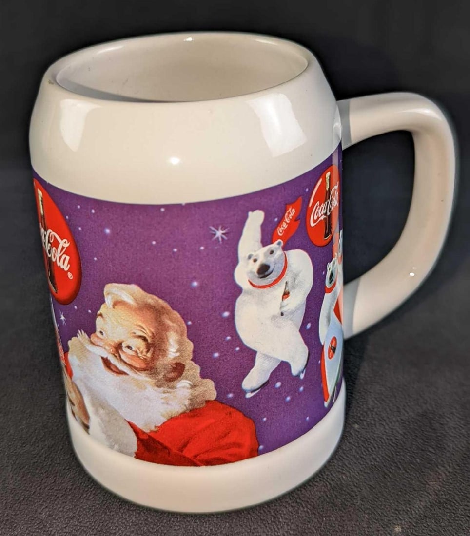 Coca Cola Santa Polar Bear Beer Mug Stein: Coca-Cola Santa Polar Bear Beer Mug Stein. Made of ceramic. Is approx 5" x 4" x 5" and it weighs 1.43lb. The stein is in a good, used condition with some signs of wear on the bottom.