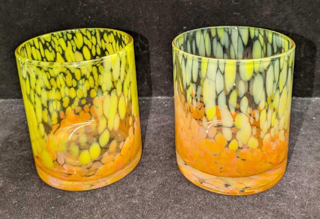 2 Mid Century Old Fashioned Drinking Glasses B: 2 Mid Century Old Fashioned Drinking Glasses B. Each glass is approx 3 1/2" x 3 1/2" x 4" and the total weight is 2.57lbs. The maker and date of creation is unknown. The bottoms have some sticker resi