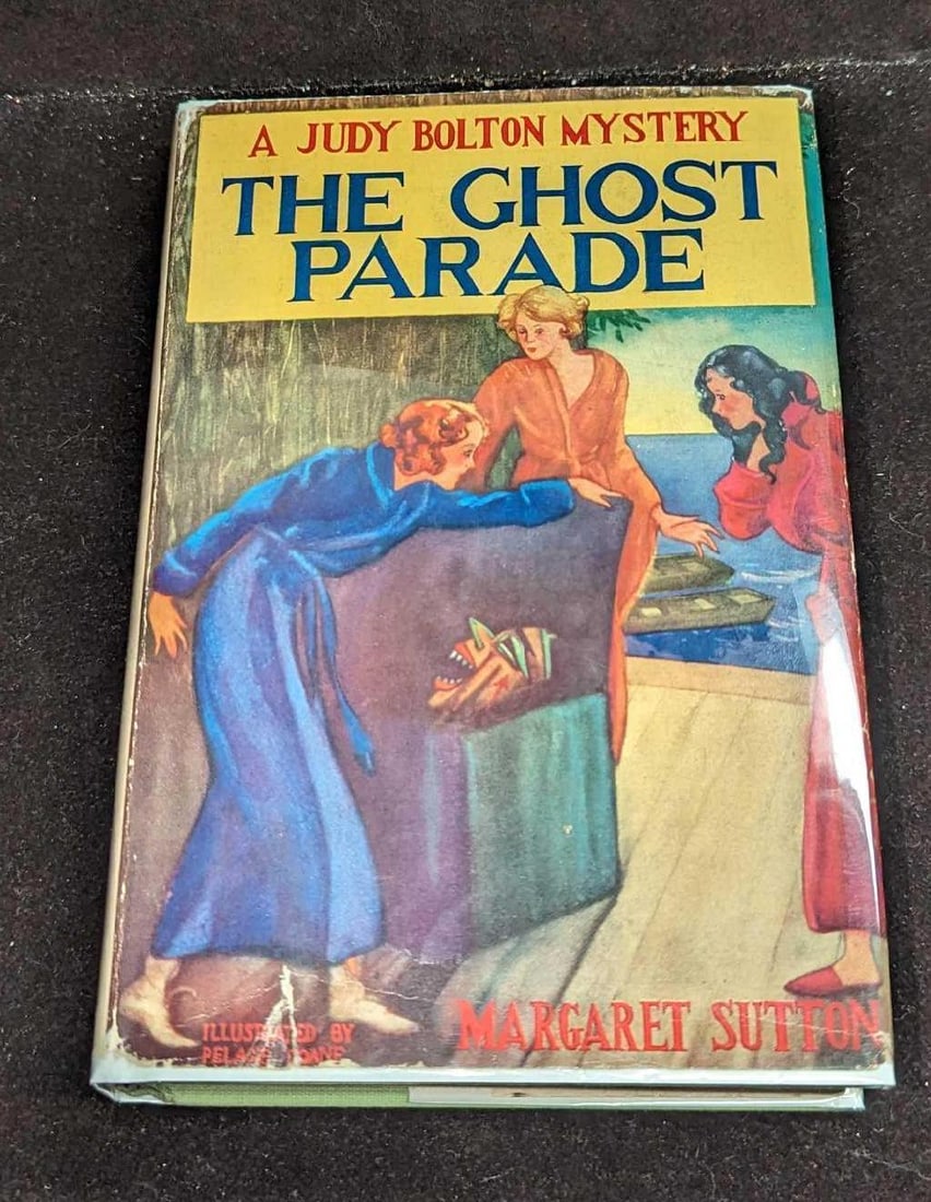1st Ed Judy Bolton The Ghost Parade HC #5: 1st Ed Judy Bolton The Ghost Parade HC #5. "A Judy Bolton Mystery - The Ghost Parade". By Margaret Sutton (The pen name of Rachel Beebe) and was published by Grosset & Dunlap (New York) and was copyri