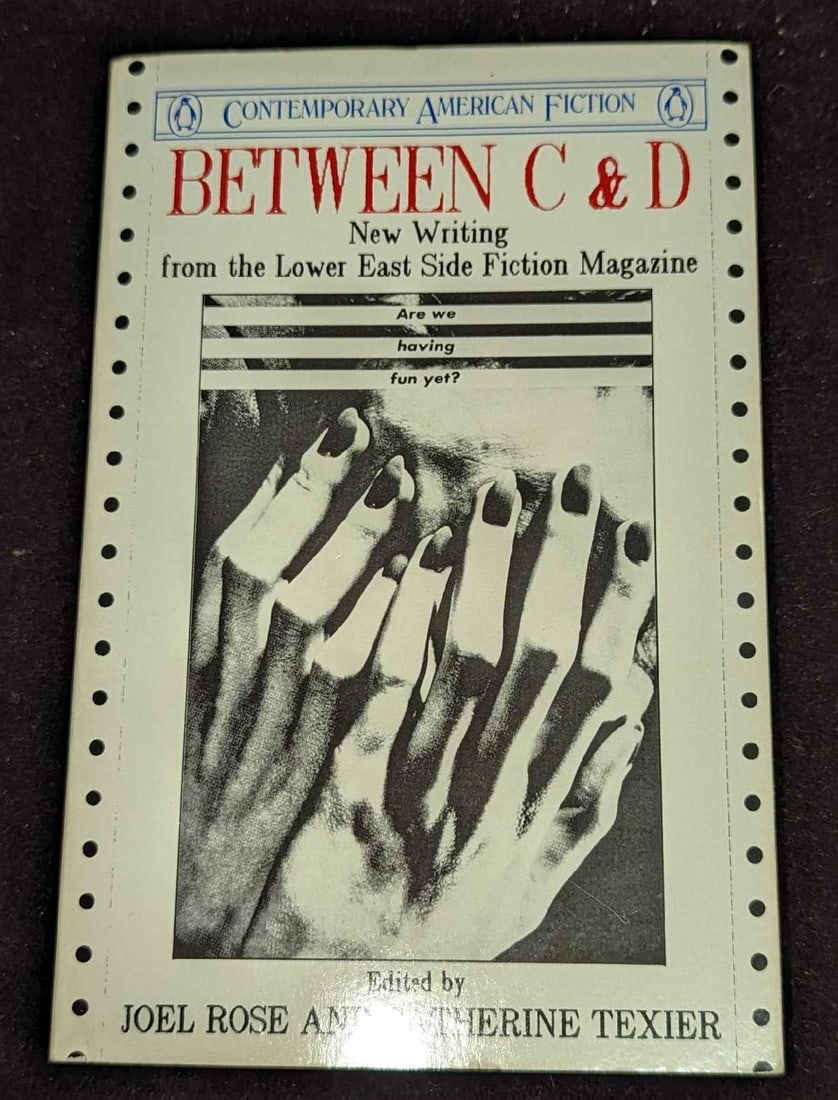 Catherine Texier Signed Between C&D Softcover Book: Catherine Texier Signed Between C&D Softcover Book. This was published by Penguin Books and was copyrighted in the year 1988. This softcover book is approx 5" x 1/2" x 7 7/8" and it we