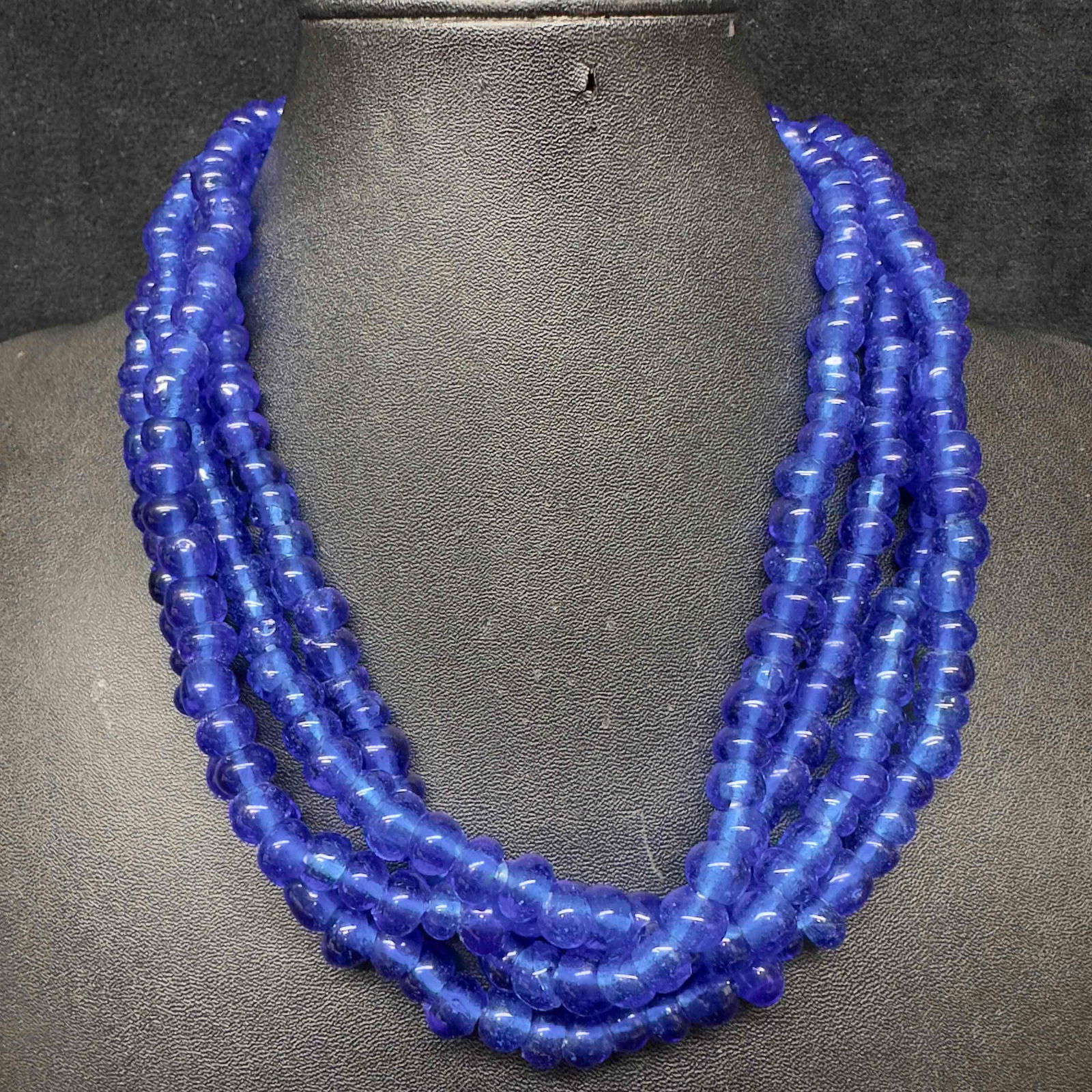 Clear Dark Blue Crystal Glass Round Beaded Large Long Necklace I46: Clear Dark Blue Crystal Glass Round Beaded Large Long Necklace I46. Necklace with clear blue colored round glass beads. The necklace is long in length. This item is in good pre-owned, previously displ