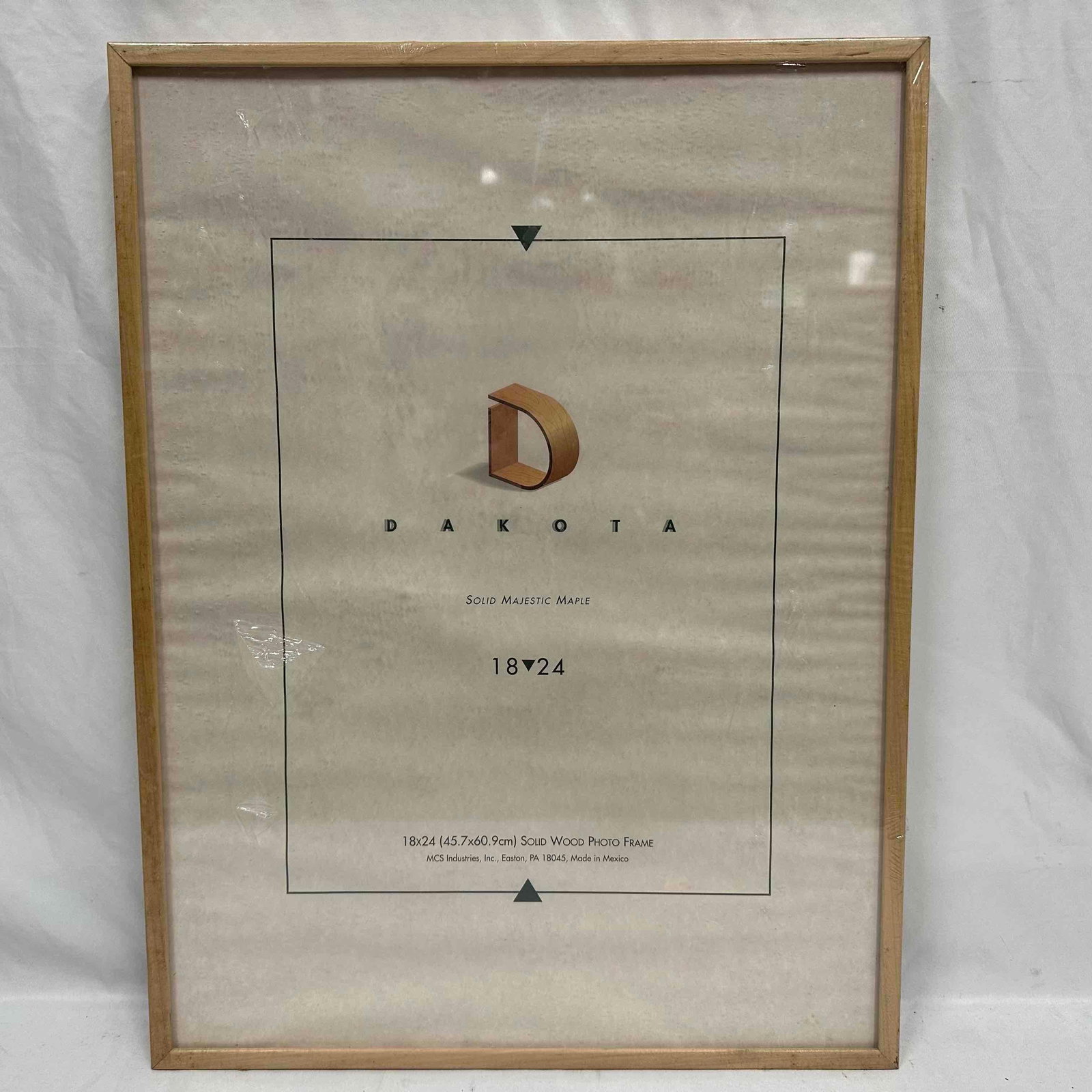 MCS Industries Dakota 18" x 24" Majestic Maple Solid Wood Photo Frame: Lot of two (2) matching MCS industries brand Dakota frames, solid majestic maple wood, sized 18" x 24" inches. Each frame is like new partially wrapped in original plastic. Showing signs of we