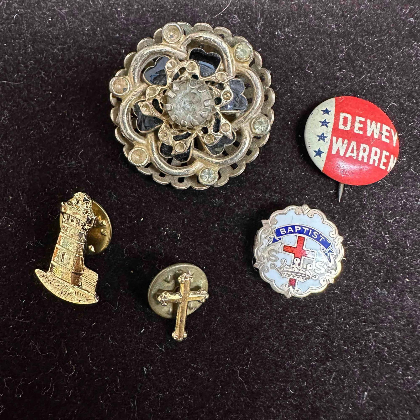 Vintage Pin and Brooch Lot Dewey Warren Campaign Baptist S.S. Pin Lighthouse & Cross Pin: Mixed lot of five vintage pins including a “Dewey Warren” campaign button, a Baptist Sunday School enamel pin, a gold-tone filigree brooch, a lighthouse lapel pin, and a small cross pin. Items