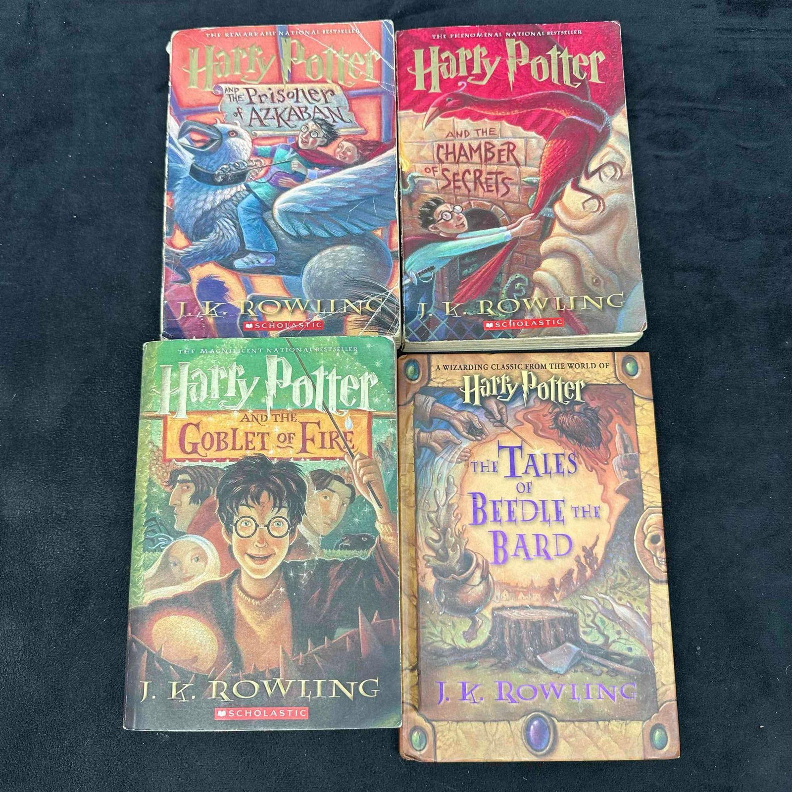 Harry Potter Paperback Lot and The Tales of Beedle the Bard Hardcover J.K. Rowling Book Set: Lot includes: Harry Potter and the Chamber of Secrets (Paperback) Harry Potter and the Prisoner of Azkaban (Paperback) Harry Potter and the Goblet of Fire (Paperback) The Tales of Beedle the Bard (Har