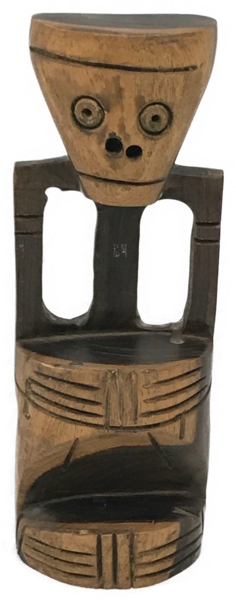 Small Carved Hardwood Figure: Small Carved Hardwood Figure; this sculpture is carved from a very dense wood (African lead wood?). It is not signed, the ghost of a label is on the bottom. This piece is from an estate that incl